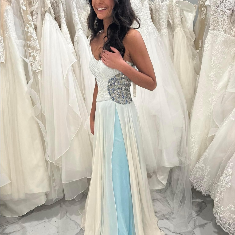 White Sherri Hill with blue underlay perfect for prom or pageant